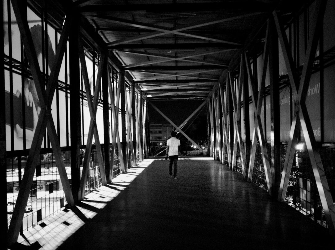 man walking alone inside building